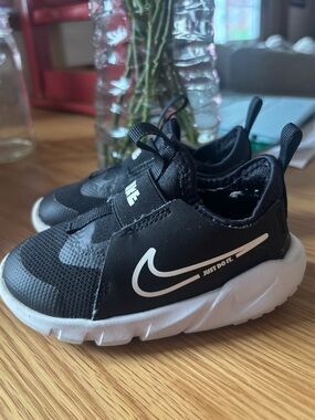 SOLD Nike Kids Black and White Slip-On Swoosh Sneakers